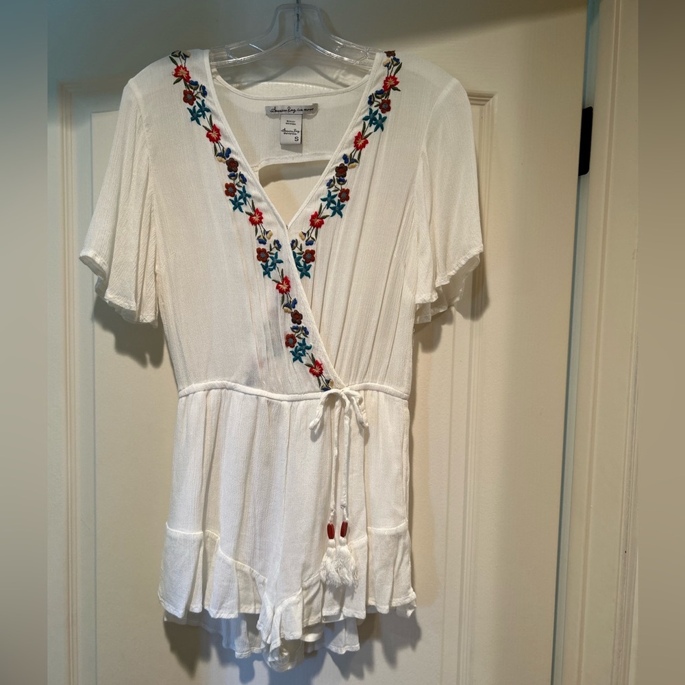 American Rag Cie White Romper with floral embroidery detailing